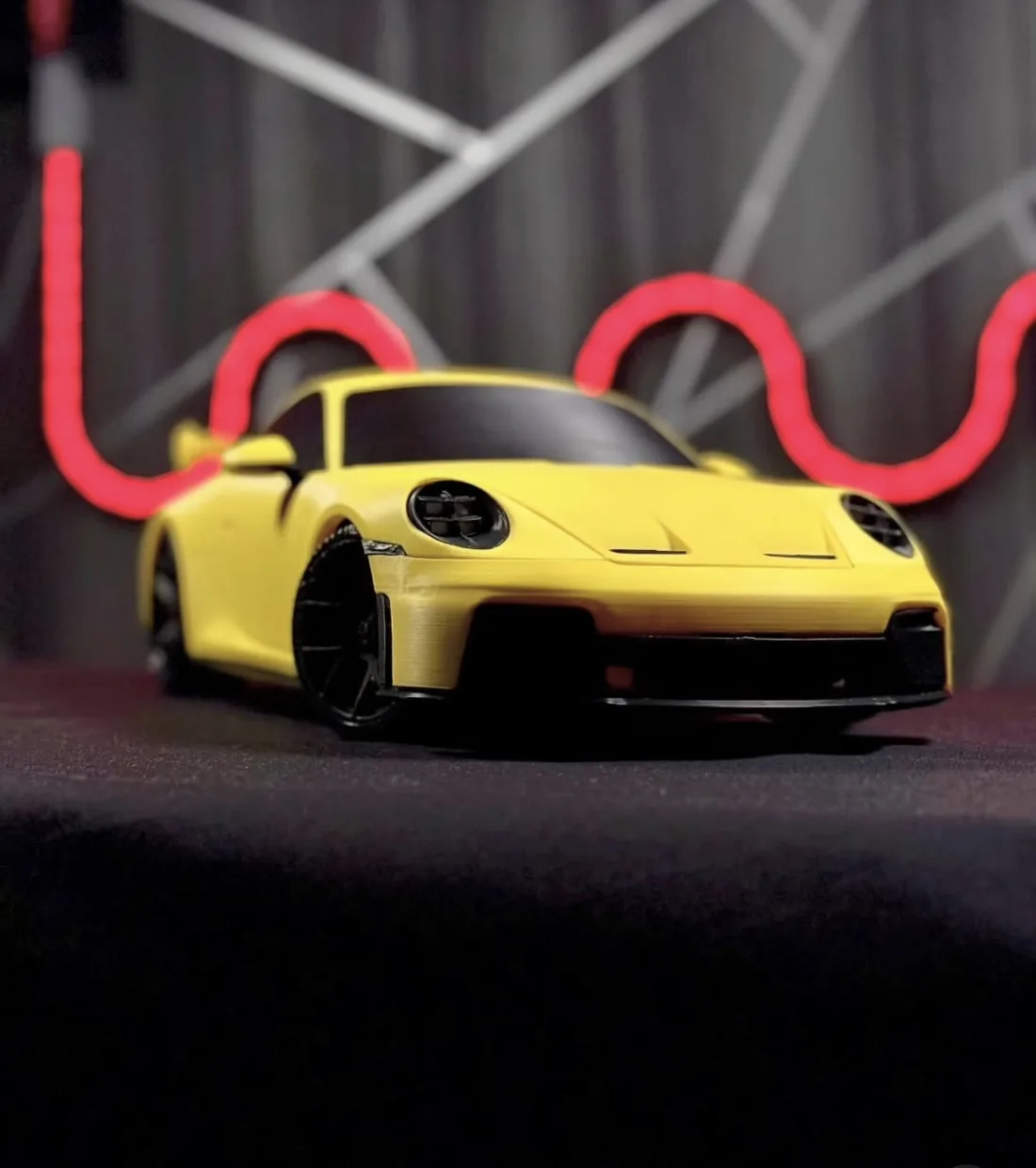 Yellow sports car scale model, custom 3D print, front view