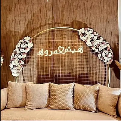 Wedding neon sign backdrop at a UAE event